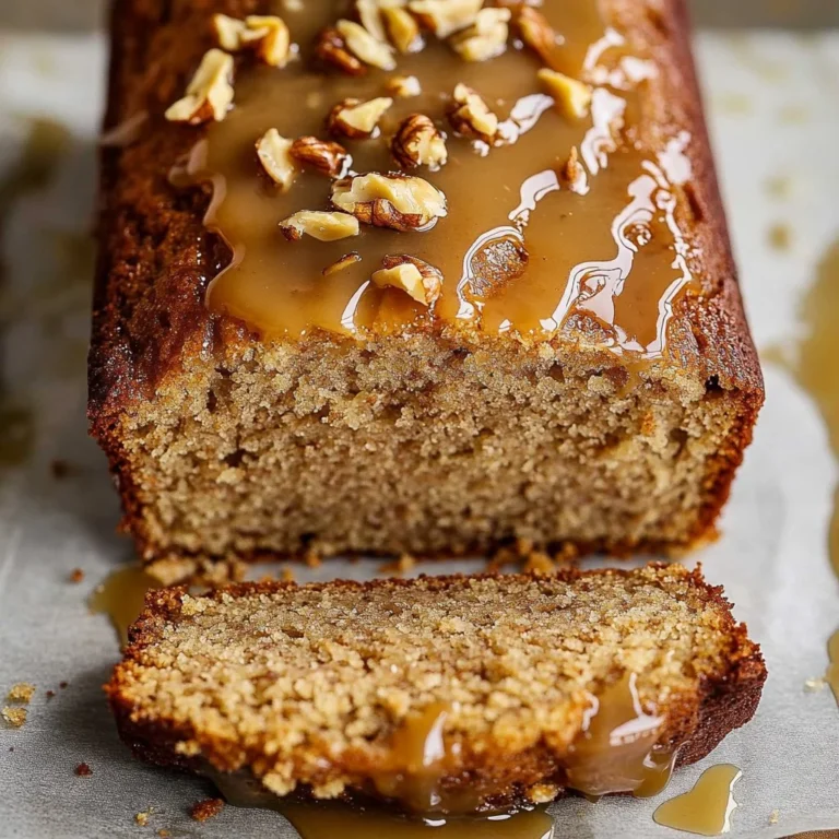 Slice of banana bread with butterscotch drizzled on top