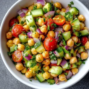 Delicious spiced chickpea salad with fresh vegetables and herbs